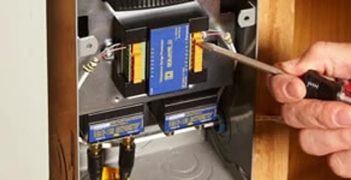 Whole home surge protection device being installed by a licensed electrician to protect electrical systems in Phoenix, AZ